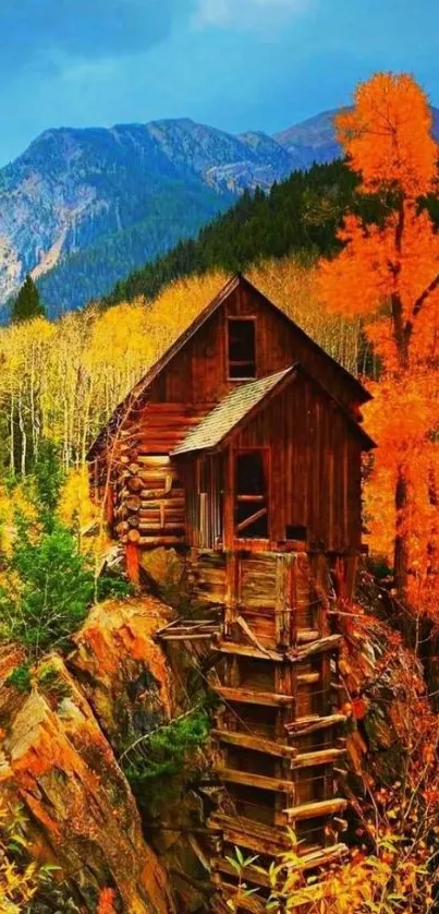 Vibrant autumn mountain cabin wallpaper with colorful foliage.