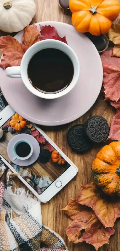 Autumn-themed wallpaper with coffee, pumpkins, and fall leaves, perfect for cozy vibes.