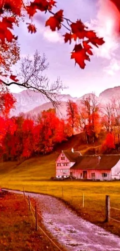 Autumn countryside with red foliage and house under clear sky.