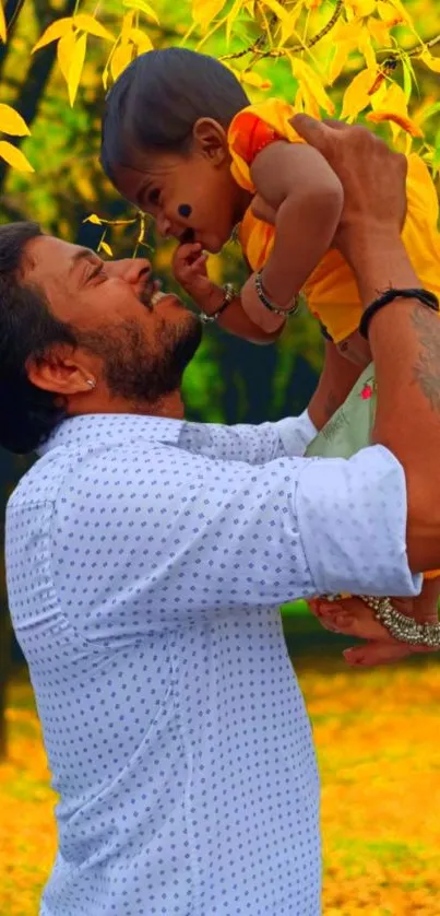 Father lifts child in autumn forest scene.