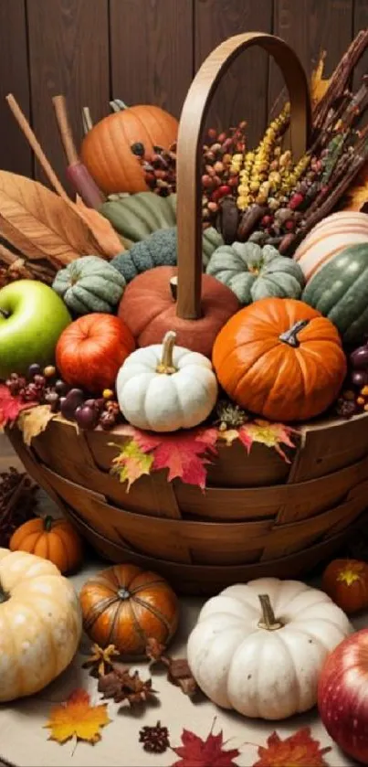 Basket filled with pumpkins, apples, and fall leaves in an autumn setting.