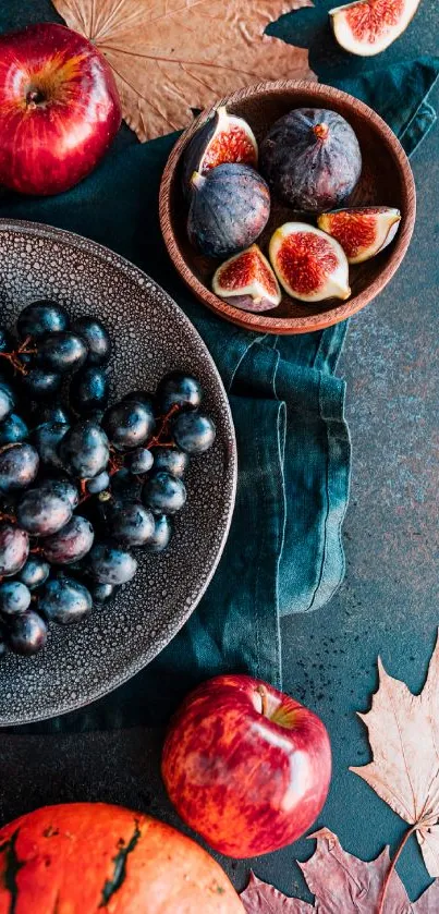 Autumn harvest wallpaper with fruits and leaves.