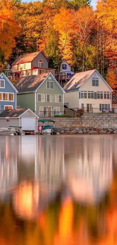 Tranquil lakeside scene with autumn trees and house reflections.