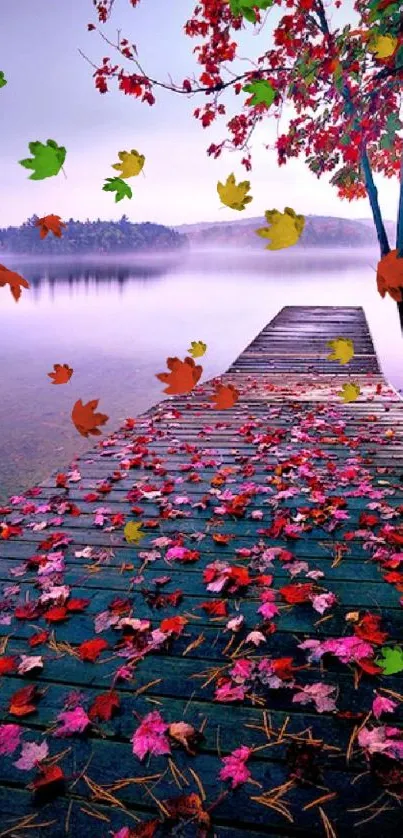 Autumn leaves on wooden pier by a serene lake with misty light.