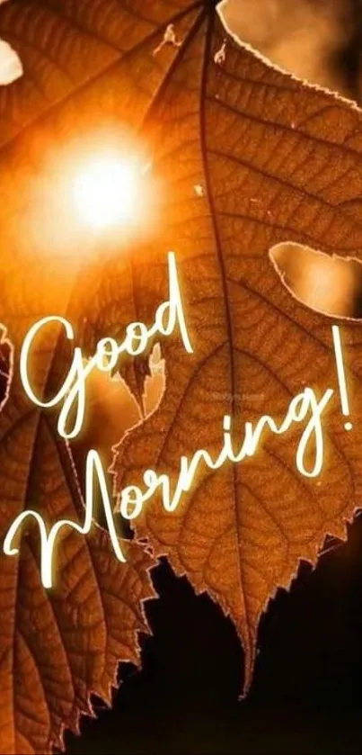 Good morning message on golden leaf with sunlight.