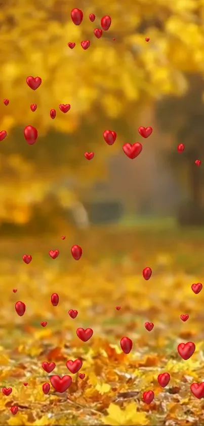 Vibrant autumn wallpaper with golden leaves and floating red hearts.