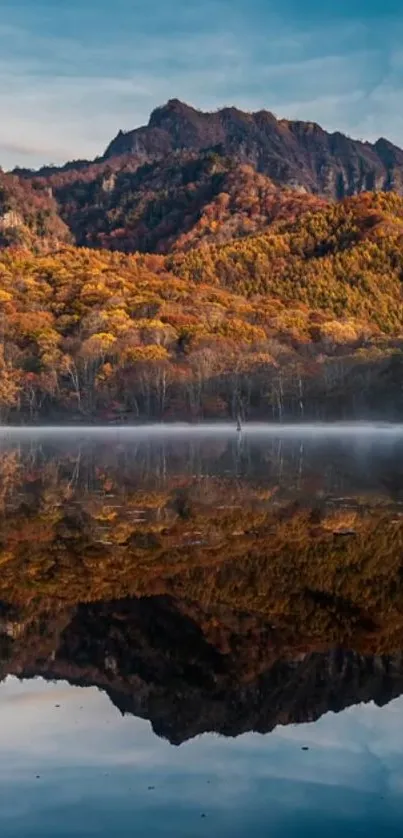 Beautiful autumn mountain and lake reflection in tranquil scenery.