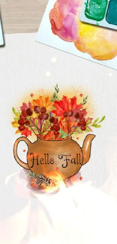 Watercolor autumn art with 'Hello Fall' teapot and brushes on canvas.