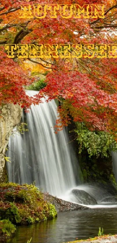 Vibrant autumn waterfall scene with red foliage.