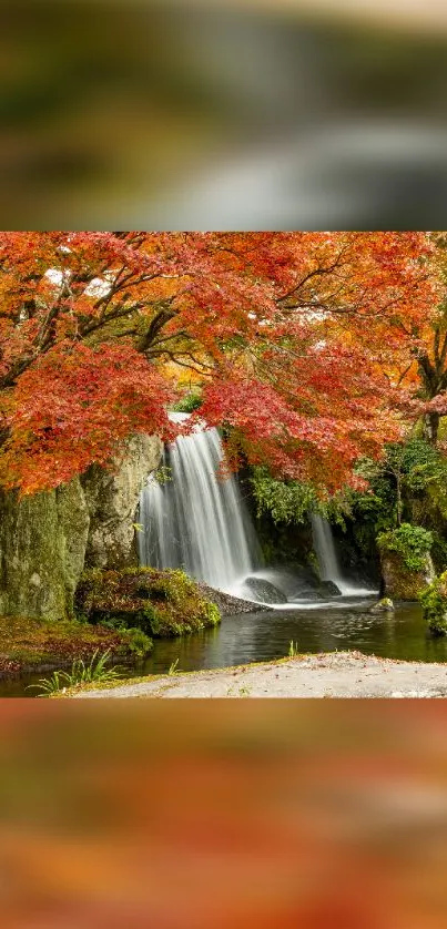 Waterfall with vibrant red autumn foliage on a serene landscape.