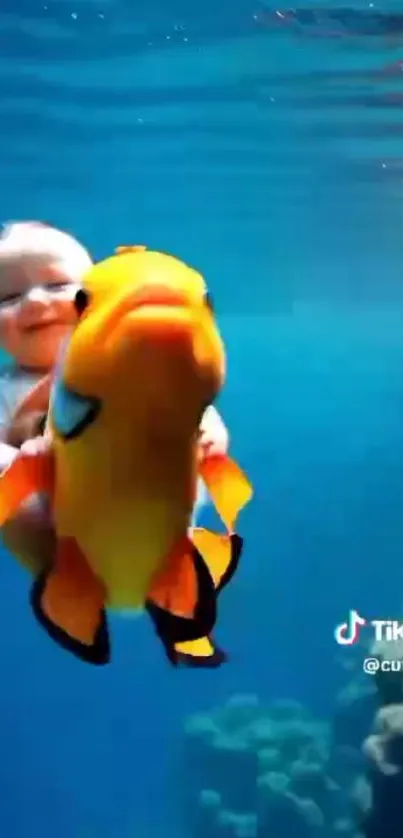 Baby joyfully riding a bright fish underwater.