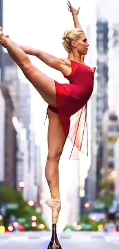 Ballet dancer performs on a bottle in a city street.