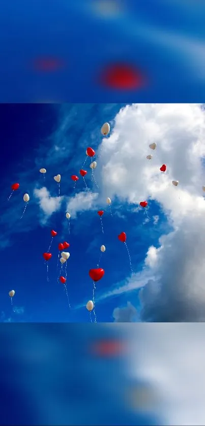 Colorful balloons floating in a blue sky with white clouds.