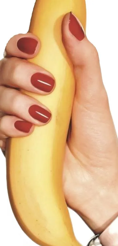 Stylish wallpaper of a banana held by a hand with red nail polish.