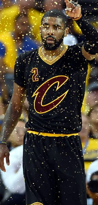 Basketball player in black jersey pointing on court.