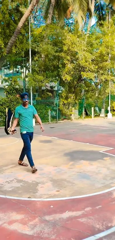 Person walking on vibrant basketball court under palm trees.