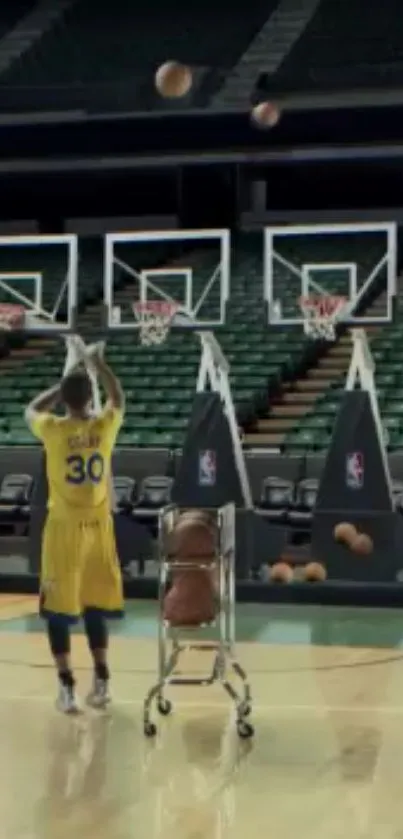 Basketball player practicing shots on an indoor court.