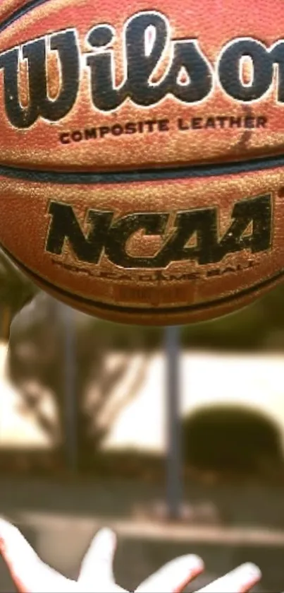 Wilson NCAA basketball in motion, perfect for sporty mobile wallpaper.