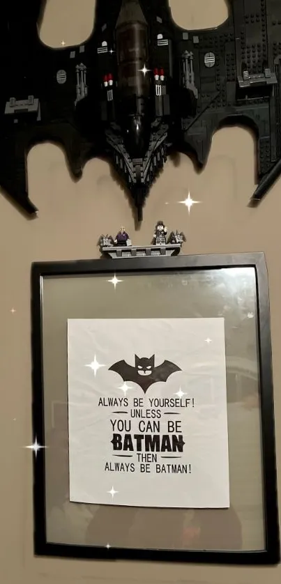 Batman-themed motivational poster with bat logo and inspirational quote.