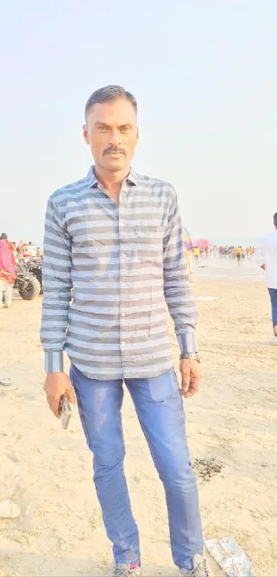 Man in casual outfit on sunny beach