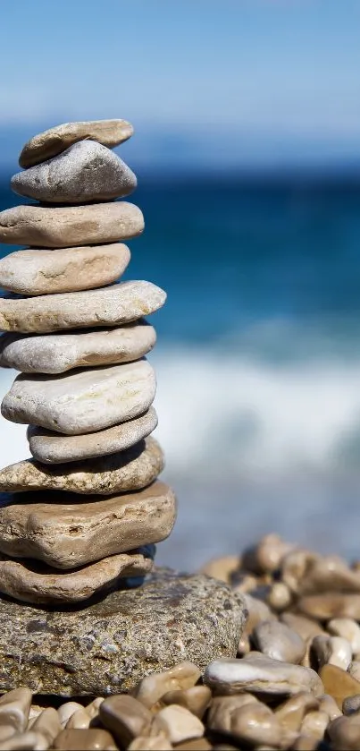 Stacked stones with ocean background.