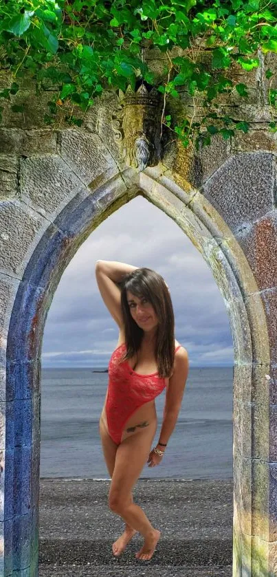 Woman in swimsuit by ancient stone arch with beach view.