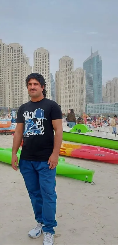 Beachfront cityscape with buildings and kayaks on a sandy shore.