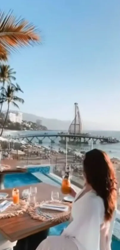 Woman enjoying beachfront dining with ocean view.