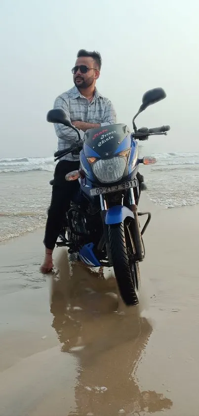 Man on motorcycle enjoying a beach ride with ocean view.