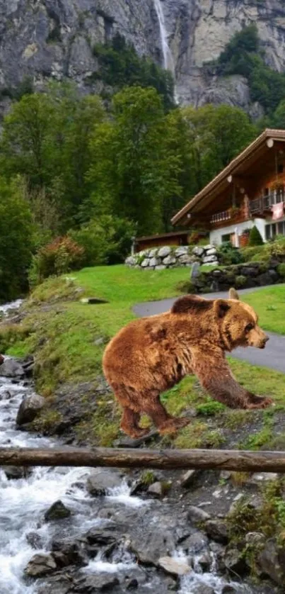 Wallpaper of a bear by a creek near a cozy cabin in a mountainous landscape.