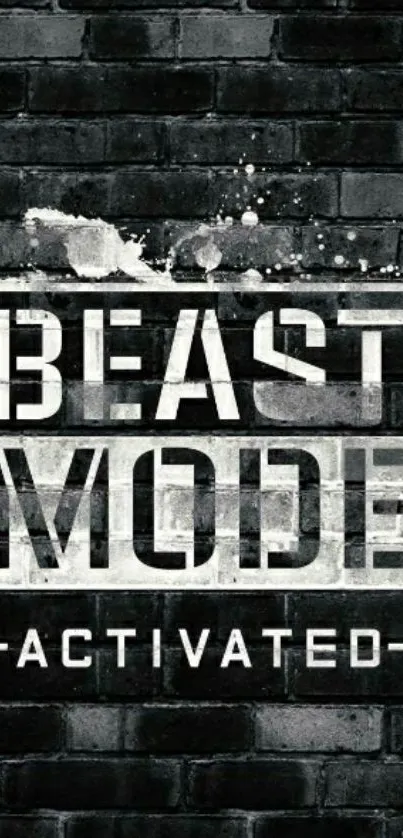 'Beast Mode Activated' on dark brick wall wallpaper.