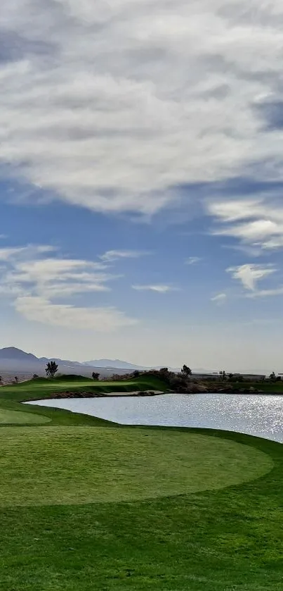 Tranquil golf course with green field and blue sky.