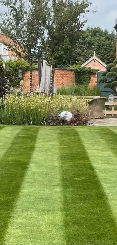 Lush green lawn with striped pattern in a tranquil garden setting.