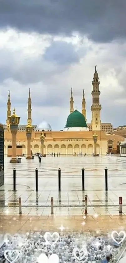 Majestic mosque under a cloudy sky with reflection and heart symbols.