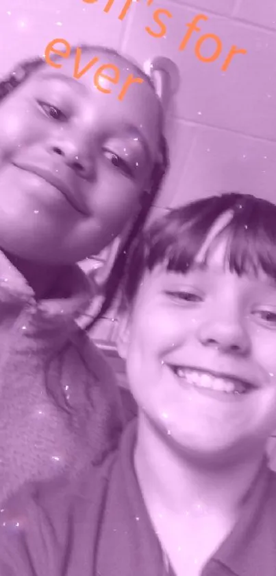 Two friends smiling in a purple-tinted photo.