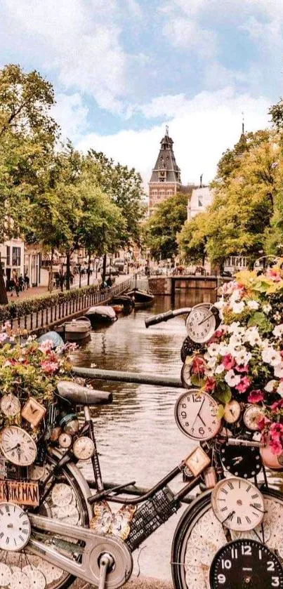 Clock-covered bicycle with flowers on an Amsterdam canal bridge.