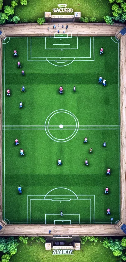 Aerial view of a soccer field with vibrant green grass and player figures.