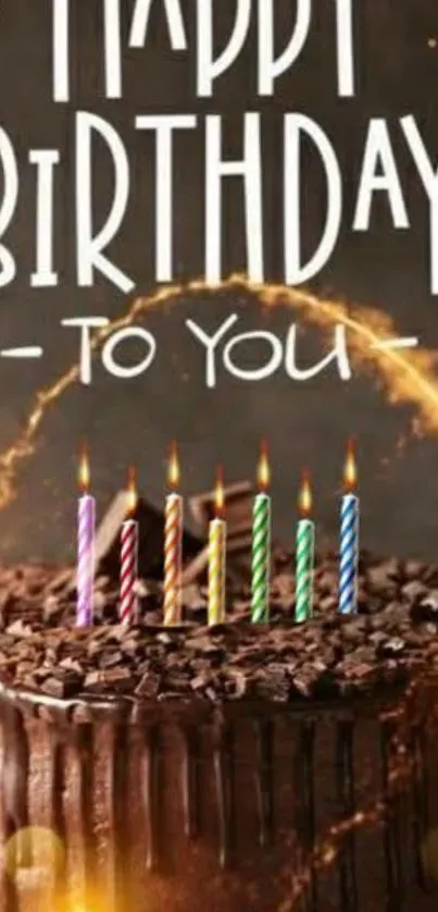 Artistic chocolate cake with candles celebrating a birthday.