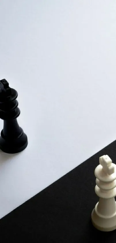 Minimalist black and white chess mobile wallpaper with chess pieces.