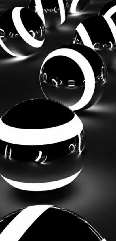 Black and white spherical design wallpaper with glowing elements.