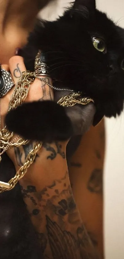 Black cat with gold chains and tattoos in a stylish composition.