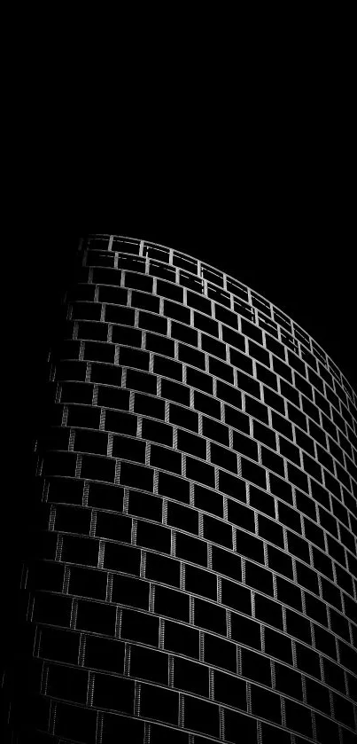 Black geometric building against a dark background for mobile wallpaper.