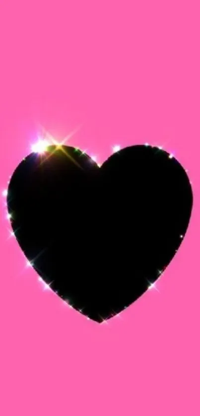 Black heart with sparkles on a vibrant pink background.