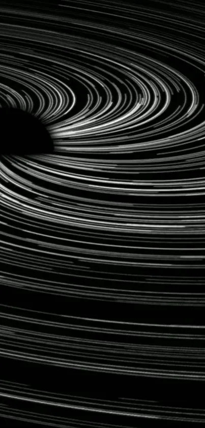 Abstract black and white swirl resembling a cosmic black hole.