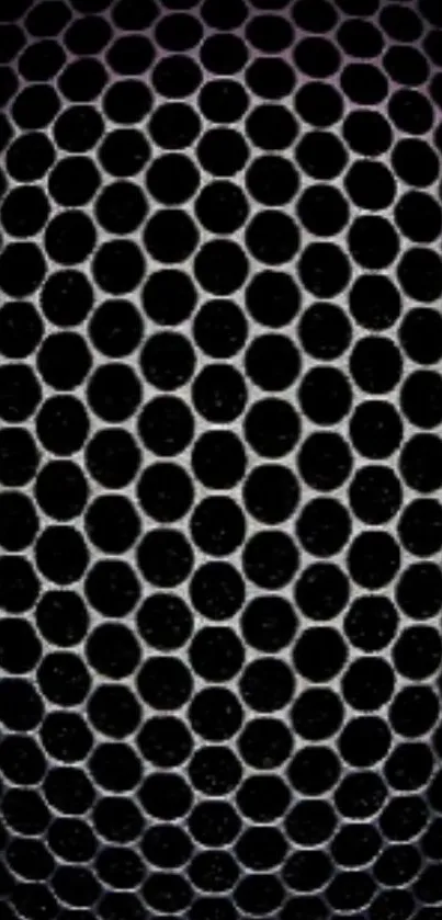 Black honeycomb pattern wallpaper with geometric design.