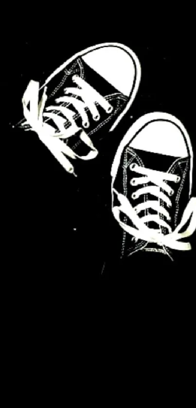 Artistic black sneakers on a dark background wallpaper