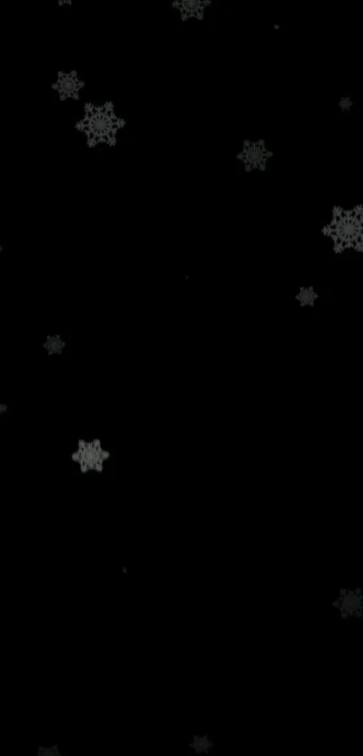 Elegant black wallpaper with snowflakes on a dark background.