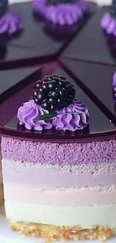 Blackberry cake with purple frosting, decorated with fresh berries.