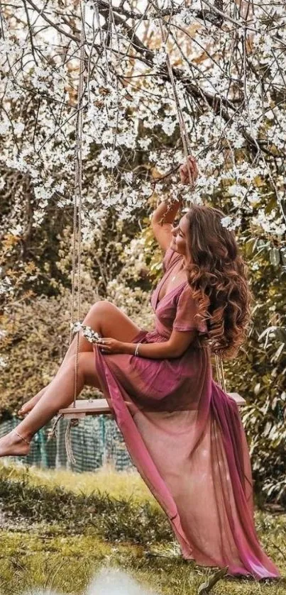 Woman on a swing under cherry blossoms.