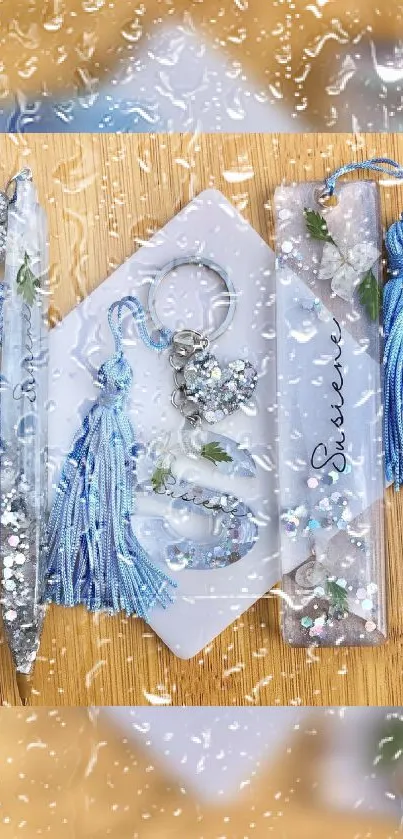 Blue aesthetic wallpaper with rain, tassels, and glitter elements.